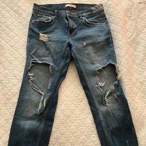 Boyfriend cropped ripped jeans from Zara in Spain